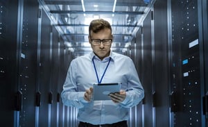 compliance-blog-post man computers