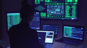 cybersecurity professional on computer